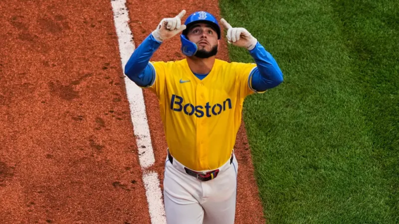 Abreu's 2 HRs Power Red Sox to 12th Straight Win