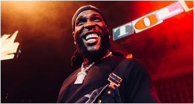Burna Boy Honors Grandfather Benson Idonije at 90