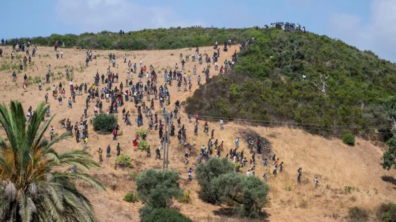 Ceuta president threatens legal action over migrant crisis