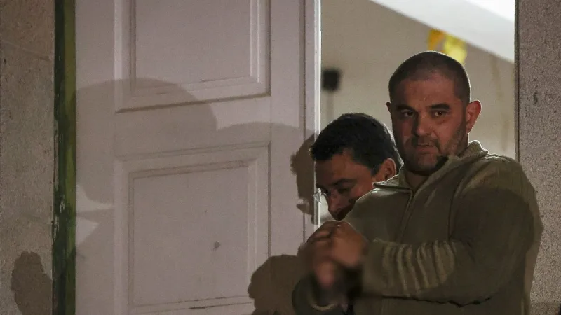 French fugitive's alleged safe haven linked to murders, arrest