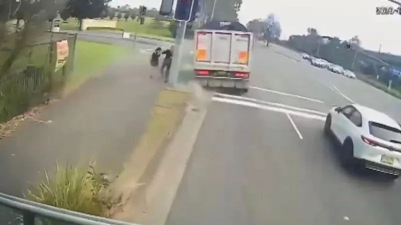 Heart stopping moment truckie ‘almost hit two school girls’