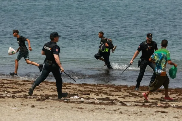 Migrant in Ceuta Says Attacked with Golf Club