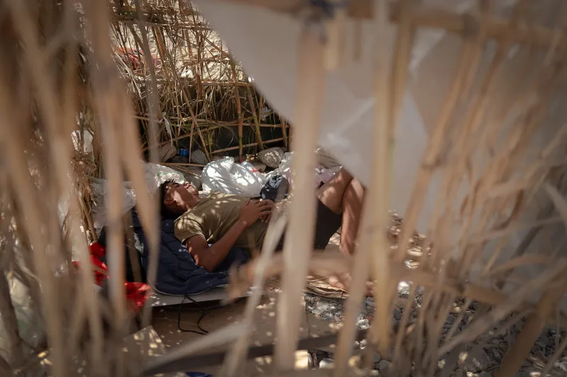 Migrants in Ceuta face hunger, makeshift camps, racial profiling