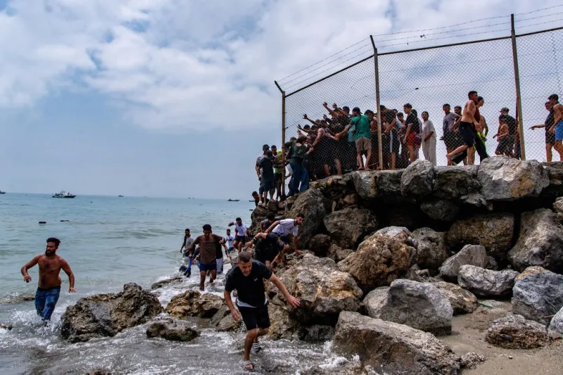 Migrants storm Morocco-Spain border at Ceuta