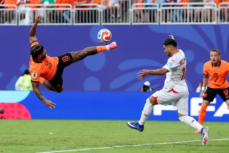 Netherlands beat Tunisia 2-0, top Group F at World Cup