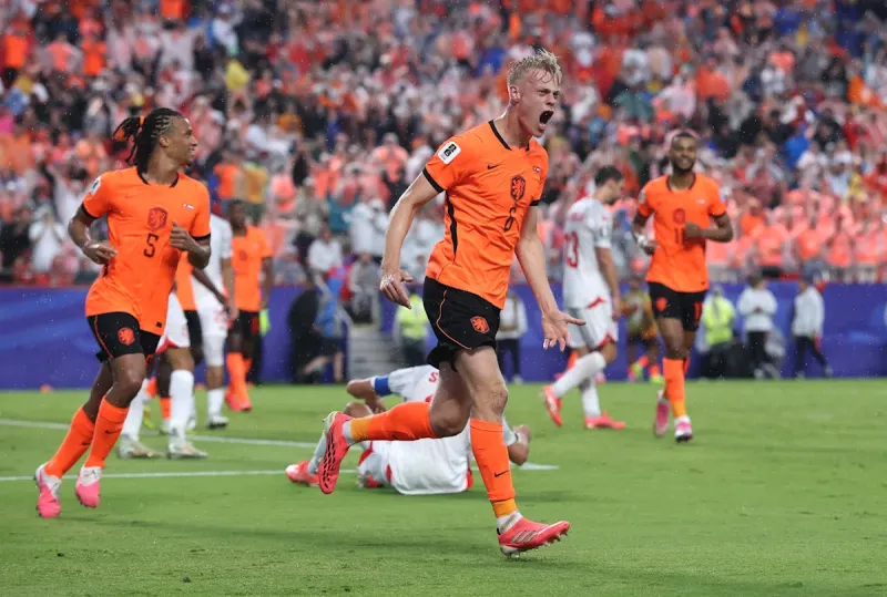 Netherlands top Group F after 3-1 win over Tunisia