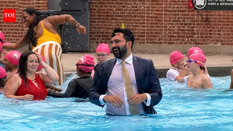 NYC Mayor Mamdani Dives in Suit for Pool Season