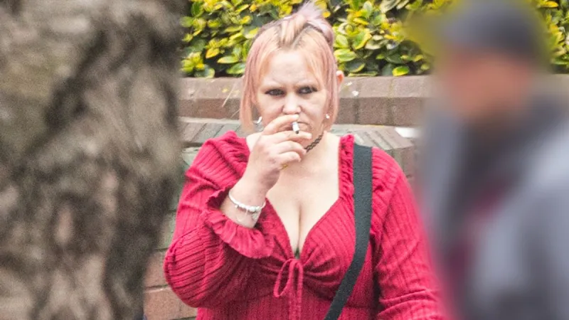 Pregnant Woman in Dressing Gown Pulls Machete on Neighbor