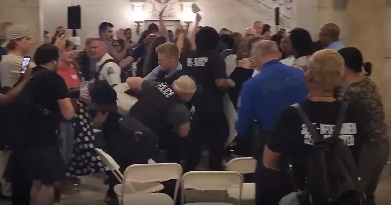 Protester detained at St. Louis mayor's address