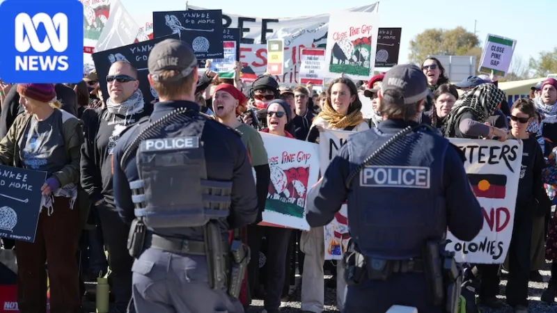 Protesters march on Pine Gap base in Alice Springs