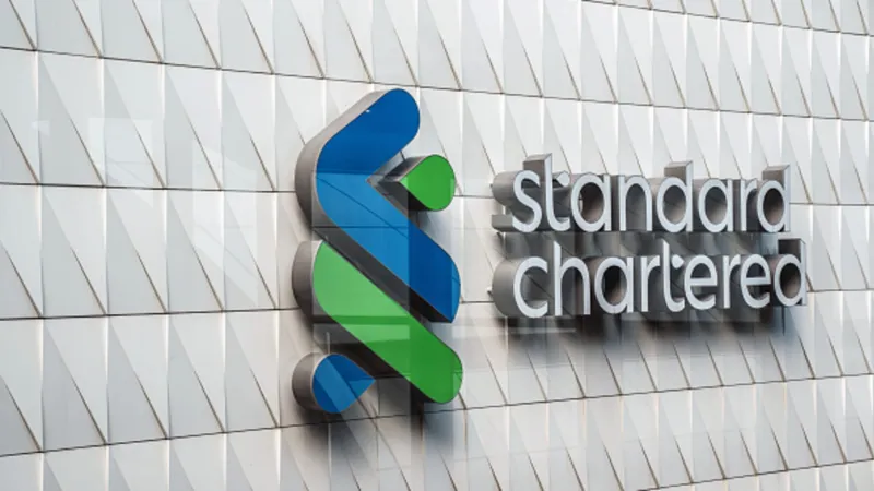 Standard Chartered to cut 15% of corporate roles, boost income per employee