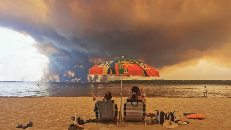 Tens of thousands evacuated as French, Spanish fires rage