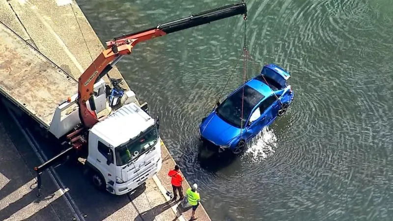 Two charged after fatal car plunge in Australia